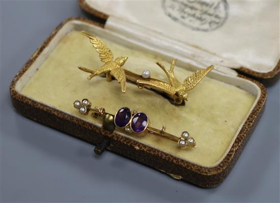 An Edwardian 15ct gold and seed pearl twin swallow brooch and a yellow metal gem set bar brooch.